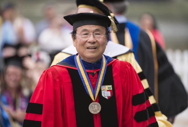 Chancellor Yang in graduation cap and gown