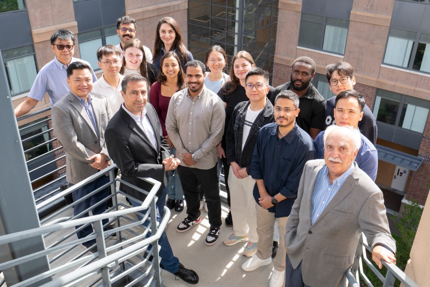 A team of researchers poses for a portrait