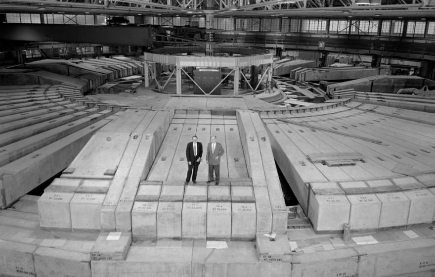 Then-Berkeley Lab Director Edwin McMillan, left, and Bevatron Group Leader Ed Lofgren, stand atop the 7-feet-thick concrete shielding at the remodeled Bevatron in this 1963 photo.